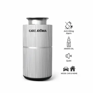 Care Aroma DriveMist silver car aroma diffuser in vehicle interior with premium design and long lasting fragrance